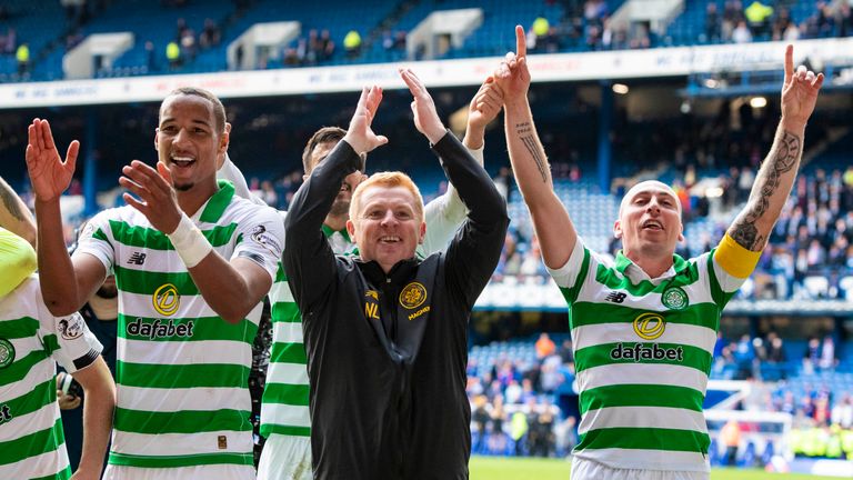 Neil Lennon celebrates with his Celtic players 