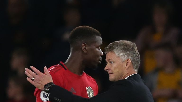 Ole Gunnar Solskjaer congratulates Paul Pogba