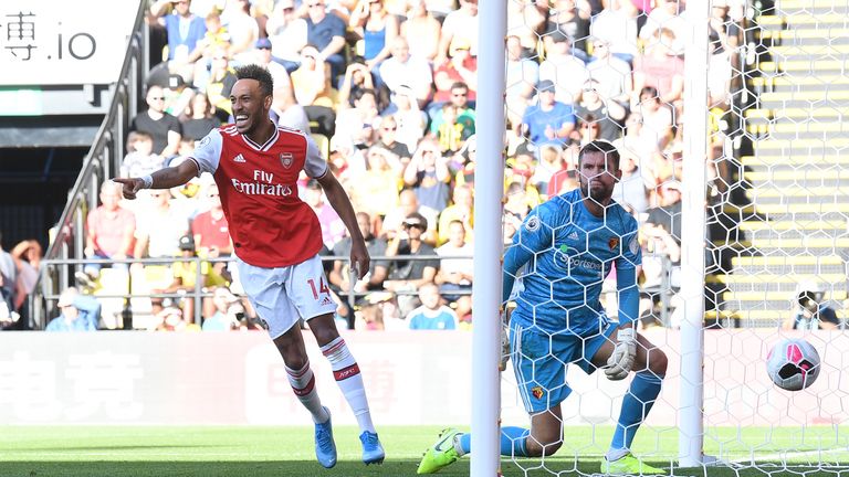 Pierre-Emerick Aubameyang celebrates his second goal away to Watford