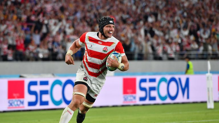 Japan's Pieter Labuschagne scores his sides third try against Russia in the Rugby World Cup