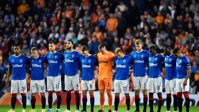 Rangers players observe a minutes silence for Fernando Ricksen