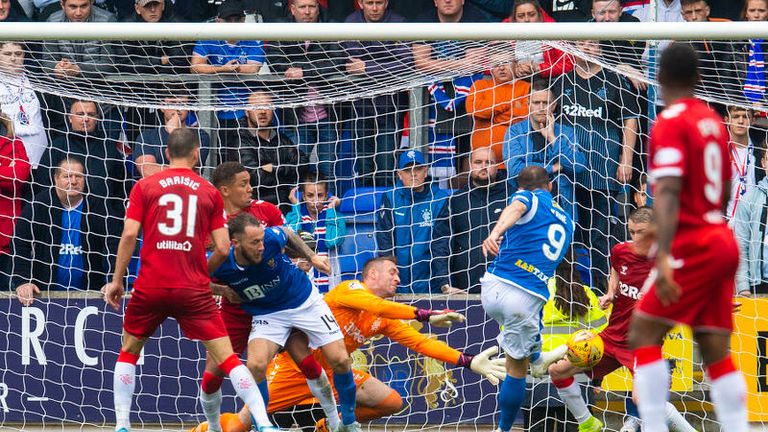 Davis scooped the ball off the line and into the hands of goalkeeper Allan McGregor