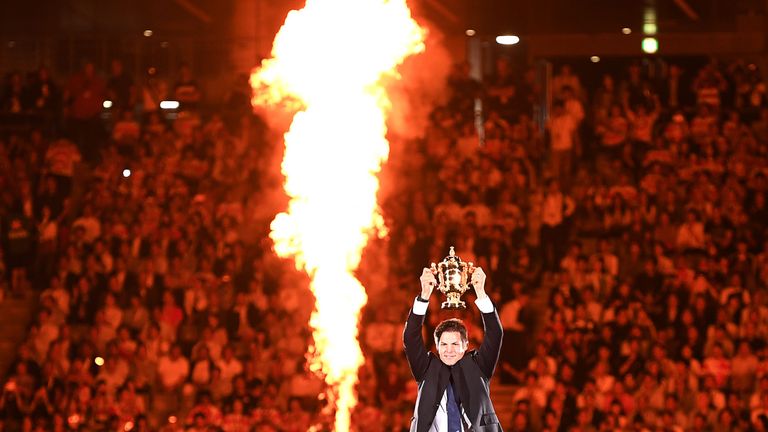 TOPSHOT - Former New Zealand international Richie McCaw holds the Rugby World Cup trophy during the tournament's opening ceremony at the Tokyo Stadium in Tokyo on September 20, 2019, ahead of the Pool A match between Japan and Russia. (Photo by CHARLY TRIBALLEAU / AFP) (Photo credit should read CHARLY TRIBALLEAU/AFP/Getty Images)