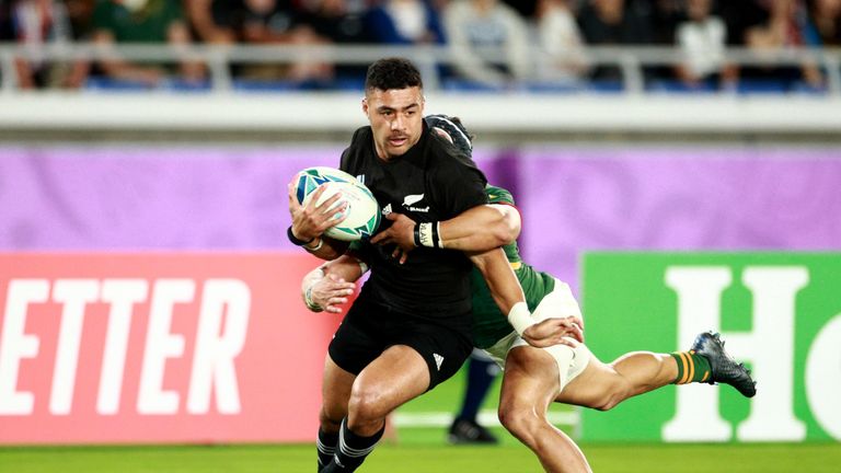 YOKOHAMA, JAPAN - SEPTEMBER 21: Richie Mo'unga of New Zealand is tackled during the Rugby World Cup 2019 Group B game between New Zealand and South Africa at International Stadium Yokohama on September 21, 2019 in Yokohama, Kanagawa, Japan. (Photo by Adam Pretty/Getty Images)