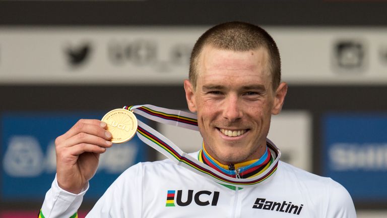 Dennis celebrates defending his time-trial title at the UCI Road World Championships