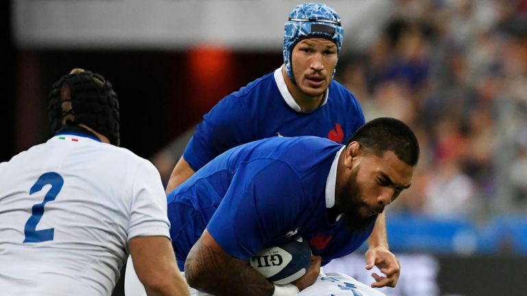 France's lock Romain Taofifenua (C) is tackled during the international Test rugby union match between France and Italy at the Stade de France in Saint-Denis, north of Paris, on August 30, 2019. (Photo by Lionel BONAVENTURE / AFP) (Photo credit should read LIONEL BONAVENTURE/AFP/Getty Images)