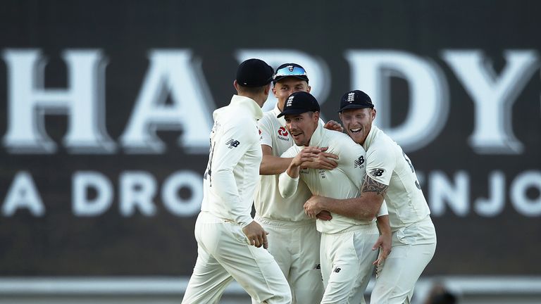 Rory Burns is congratulated by his England team-mates after taking a superb catch in the gully to end Australia's first innings