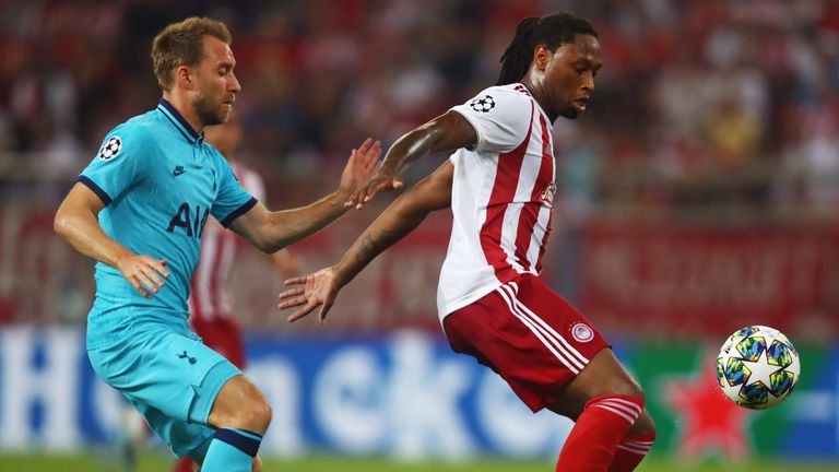 Ruben Semedo of Olympiakos is closed down by Christian Eriksen of Tottenham Hotspur during the UEFA Champions League group B match