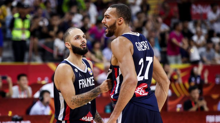 Rudy Gobert of France celebrates the victory with teammate Evan Fournier after the quarter final of 2019 FIBA World Cup between USA and France