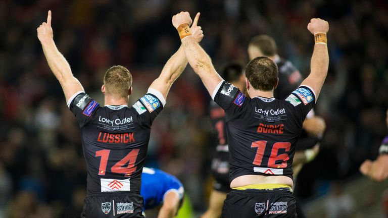 Joey Lussick and Greg Burke of Salford celebrate the win.