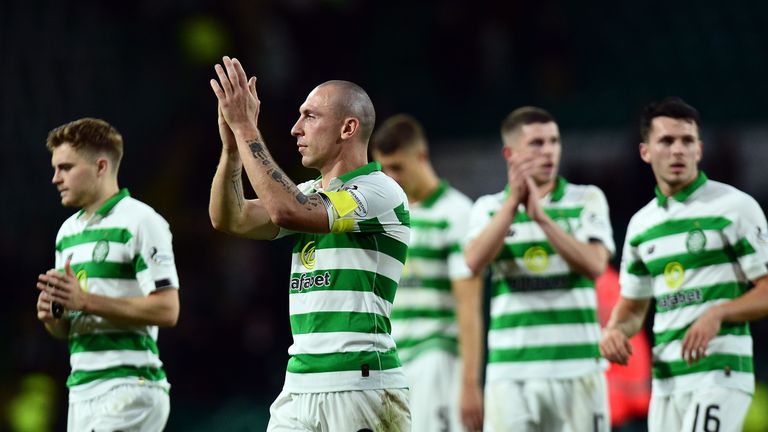 Celtic captain Scott Brown applauding supporters
