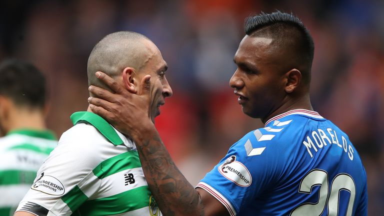 Celtic's Scott Brown and Rangers' Alfredo Morelos on the pitch during the Old Firm derby