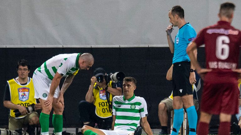 07/08/19 UEFA CHAMPIONS LEAGUE 3RD QUALIFYING ROUND 1ST LEG.CFR CLUJ v CELTIC.CLUJ-NAPOCA - ROMANIA.Celtic's Jozo Simunovic (centre) goes down with an injury 