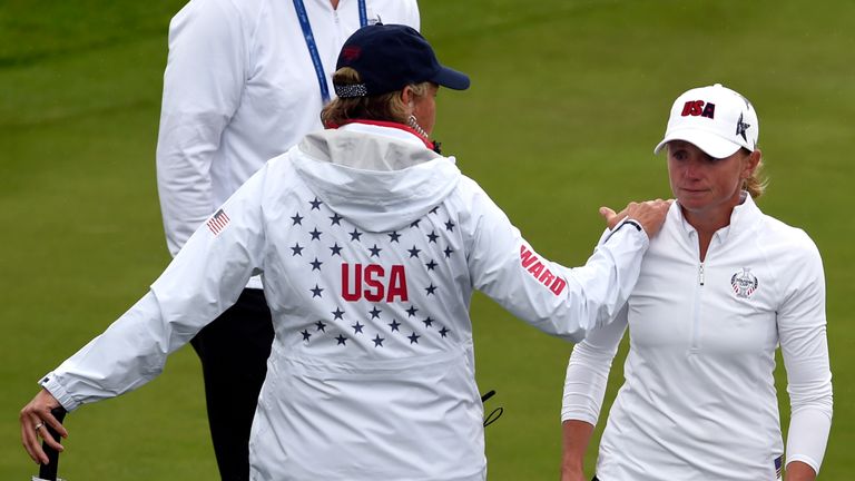Team USA's Stacy Lewis is consoled after playing a shot on the 15th during preview day one of the 2019 Solheim Cup