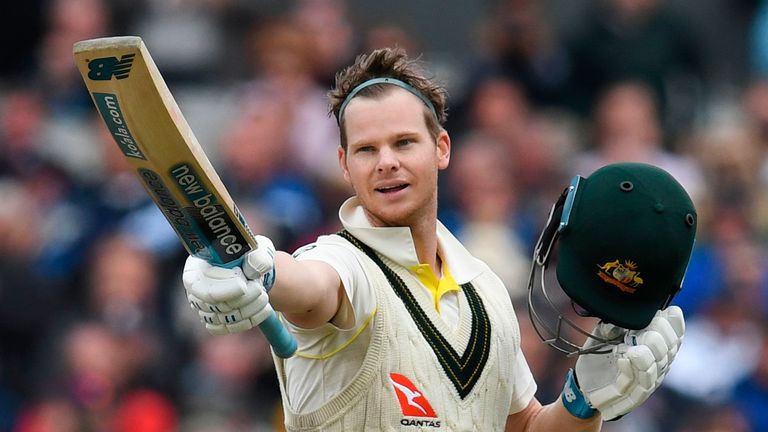 Australia's Steve Smith celebrates making 100 runs on the second day of the fourth Ashes cricket Test match between England and Australia at Old Trafford in Manchester, north-west England on September 5, 2019. 