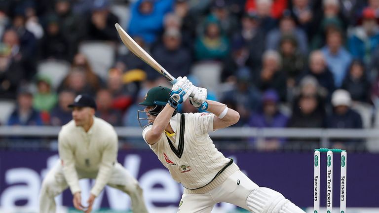 Australia's Steve Smith reaches fifty with an eccentric shot