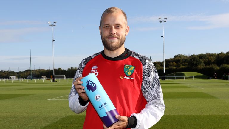 Teemu Pukki is presented with his award after being named Premier League Player of the Month for August 