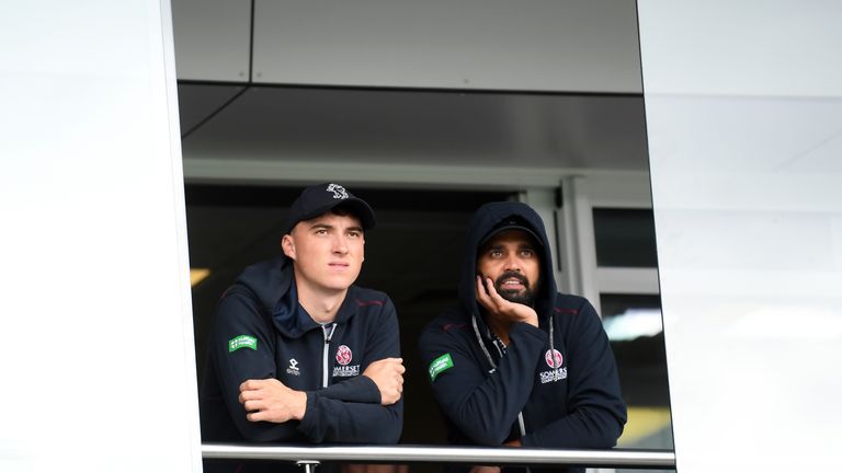 TAUNTON, ENGLAND - SEPTEMBER 25: Tom Banton and Murali Vijay of Somerset look on as rain continues to delay play during Day Three of the Specsavers County Championship Division One match between Somerset and Essex at The Cooper Associates County Ground on September 25, 2019 in Taunton, England