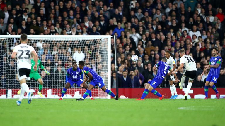 Tom Cairney scored a stunning goal in Fulham's 2-0 victory over Wigan