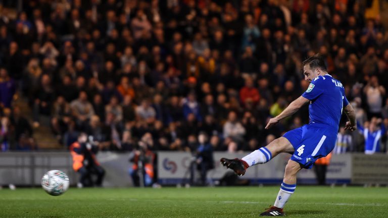 Tom Lapslie buried Colchester's winning penalty to see them into the fourth round