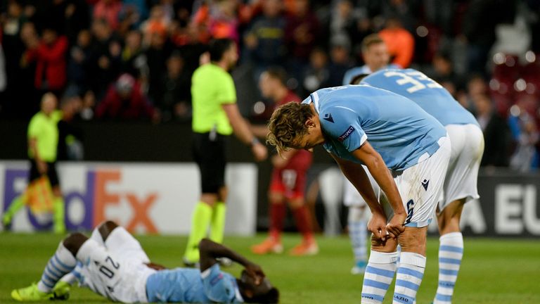 Lucas Leiva slumps to the ground after Lazio were beaten by CFR Cluj