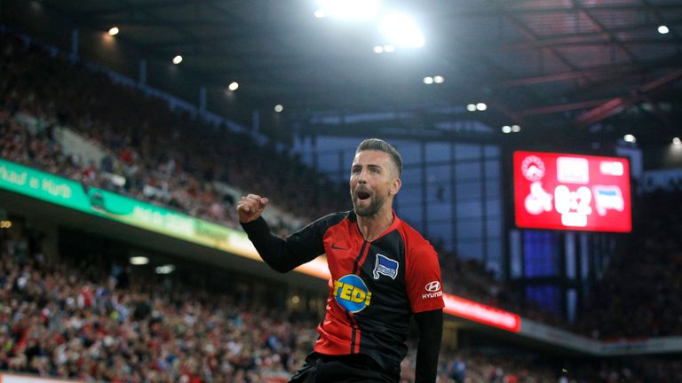 Vedad Ibisevic scored twice as Hertha Berlin beat 10-man Cologne