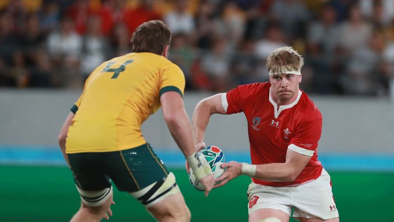 CHOFU, JAPAN - SEPTEMBER 29: Aaron Wainwright of Wales takes on Izack Rodda during the Rugby World Cup 2019 Group D game between Australia and Wales at Tokyo Stadium on September 29, 2019 in Chofu, Tokyo, Japan. (Photo by David Rogers/Getty Images)
