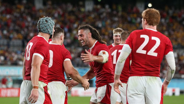 CHOFU, JAPAN - SEPTEMBER 29: Gareth Davies of Wales celebrates with team mate Josh Navidi after scoring his sides second try during the Rugby World Cup 2019 Group D game between Australia and Wales at Tokyo Stadium on September 29, 2019 in Chofu, Tokyo, Japan. (Photo by Craig Mercer/MB Media/Getty Images)