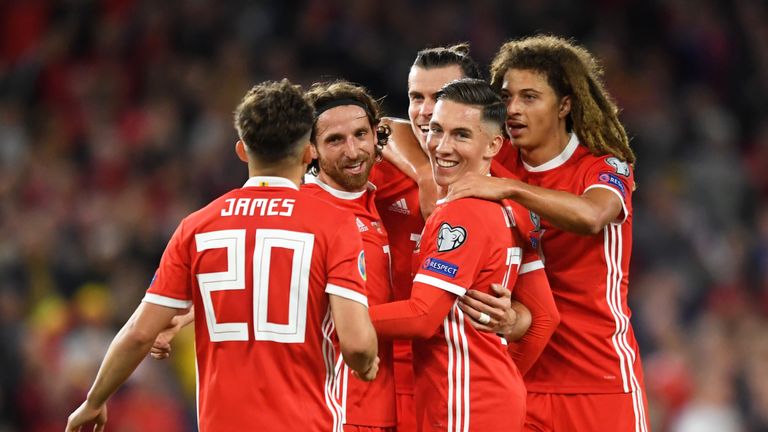Dan James and Wales team-mates celebrate benefiting from an own goal against Azerbaijan