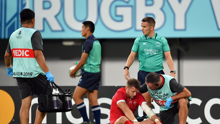 Wales' Dan Biggar receiving medical attention during the Rugby World Cup 2019 Group D game between Australia and Wales at Tokyo Stadium 