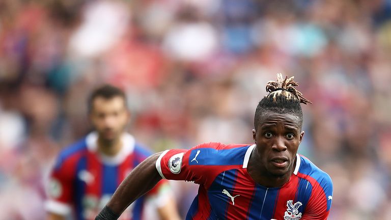 Wilfried Zaha in action during the Premier League match against Aston Villa at Selhurst Park
