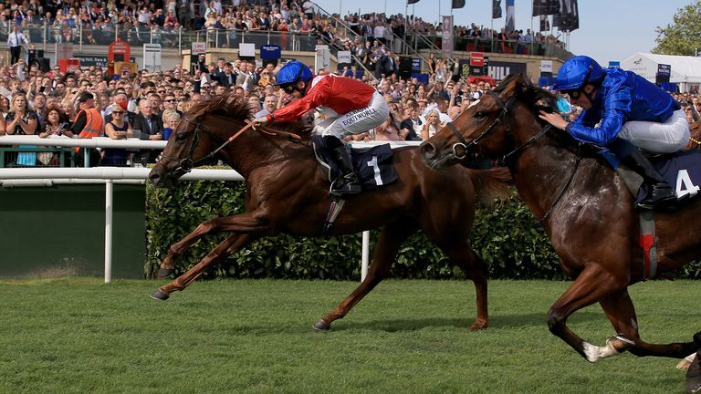 Threat (Left) ridden by Pat Dobbs wins the Pommery Champagne Stakes during day four of the William Hill St Leger Festival at Doncaster Racecourse. PA Photo. Picture date: Saturday September 14, 2019. See PA story RACING Doncaster. Photo credit should read: Clint Hughes/PA Wire