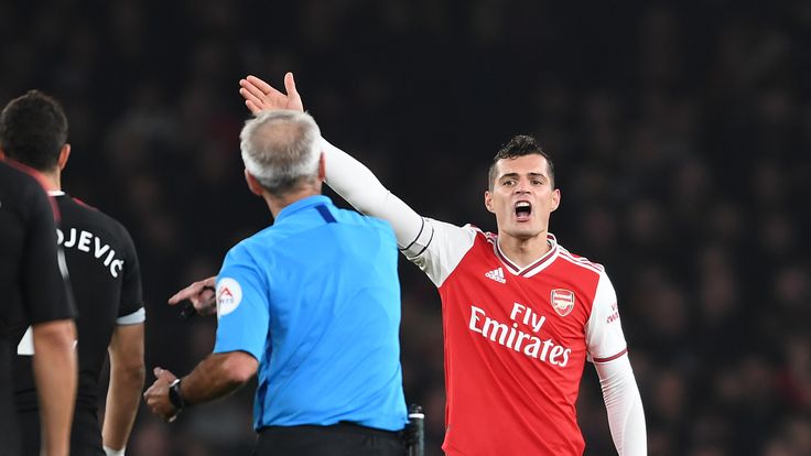 Granit Xhaka gestures to referee Martin Atkinson during Arsenal's 2-2 draw at home to Crystal Palace