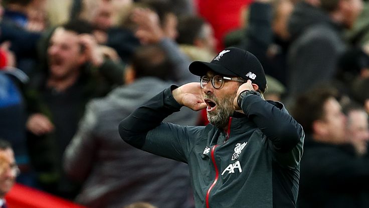 Jurgen Klopp cups his ears in celebration during the Premier League match between Liverpool and Leicester City at Anfield