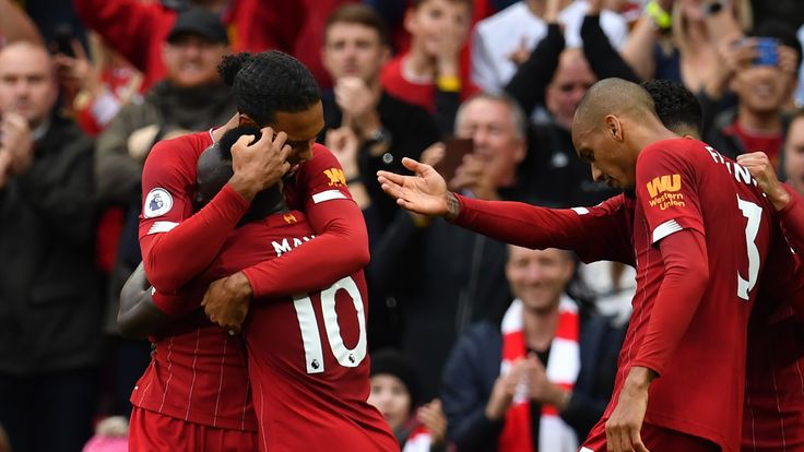 Virgil Van Dijk and Sadio Mane celebrate Liverpool's opener against Leicester