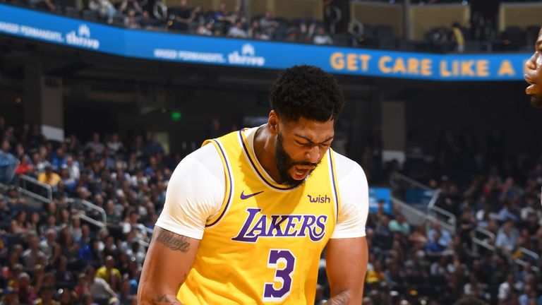 Anthony Davis celebrates his first Lakers basket