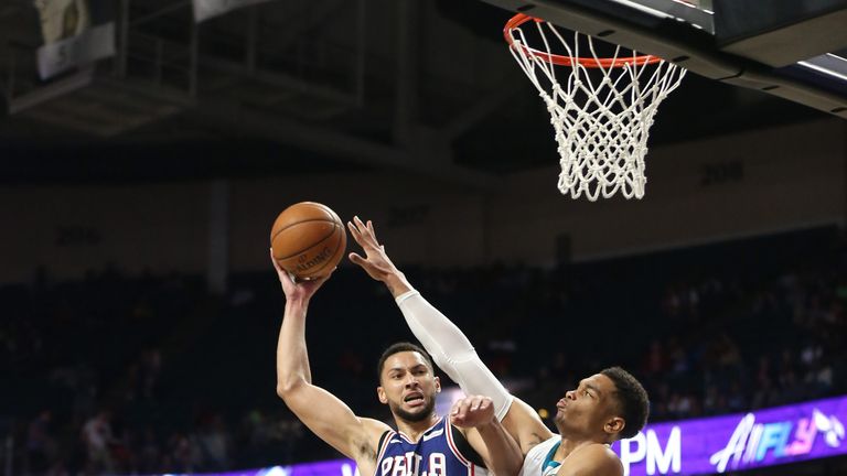 Ben Simmons attacks the basket against the Charlotte Hornets