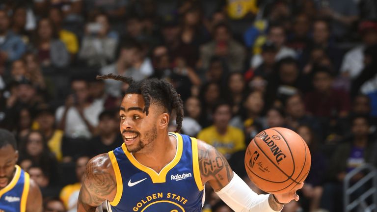 D'Angelo Russell dribbles up court in the Warriors' preseason game against the Lakers