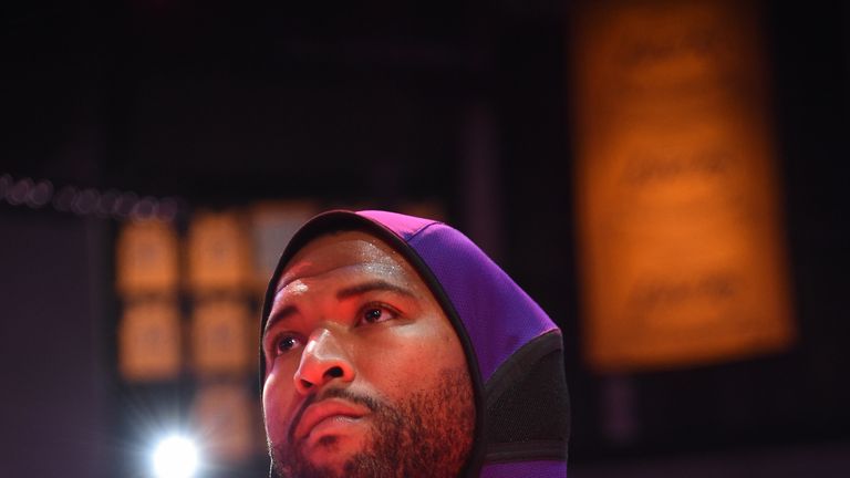 DeMarcus Cousins of the Los Angeles Lakers stands for the National Anthem before a preseason game against the Golden State Warriors