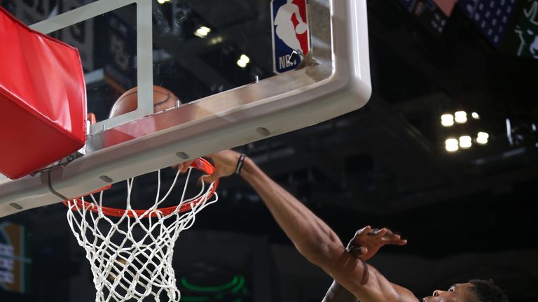 Giannis Antetokounmpo throws down a dunk against the Utah Jazz