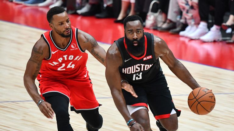 James Harden drives by Norman Powell