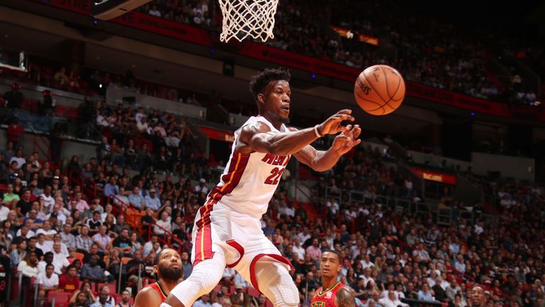 Jimmy Butler throws a pass during his Miami debut