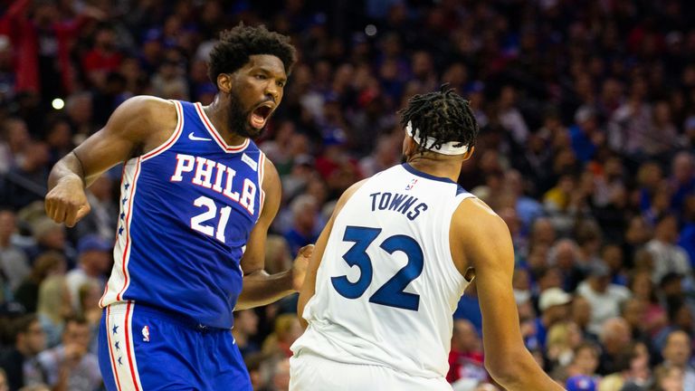 Joel Embiid faces off with Karl-Anthony Towns during the Sixers win over the Timberwolves