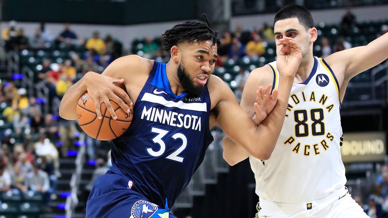 Karl-Anthony Towns drives at the Pacers&#39; defense