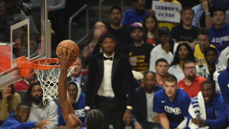 Kawhi Leonard throws down an emphatic dunk against the Lakers
