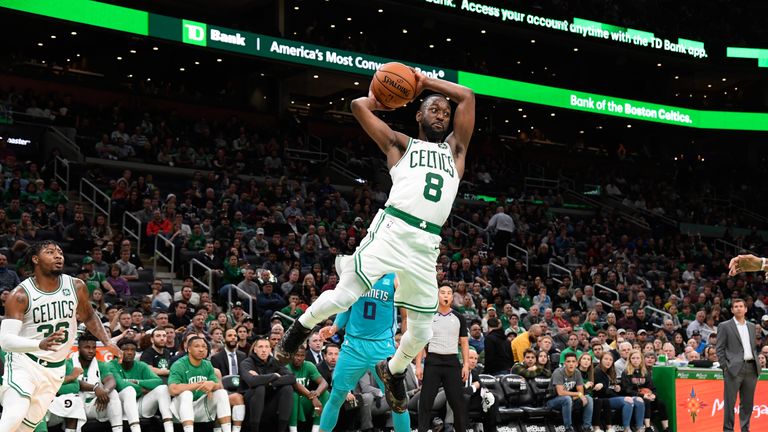Kemba Walker goes airborne to throw a pass in the Celtics' preseason win over the Hornets