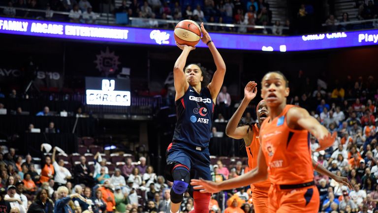 Kristi Toliver lofts a floater over the Connecticut defense in Game 3 of the WNBA Finals