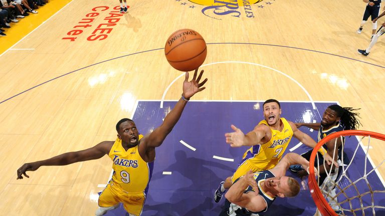 Luol Deng corrals a rebound for the Los Angeles Lakers