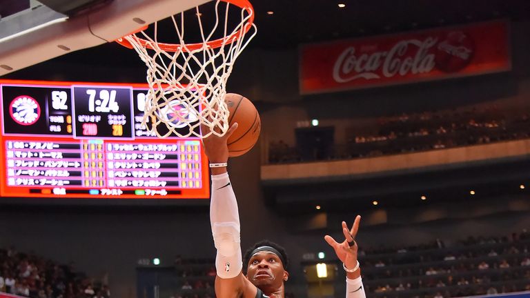 Russell Westbrook finishes at the rim against the Raptors