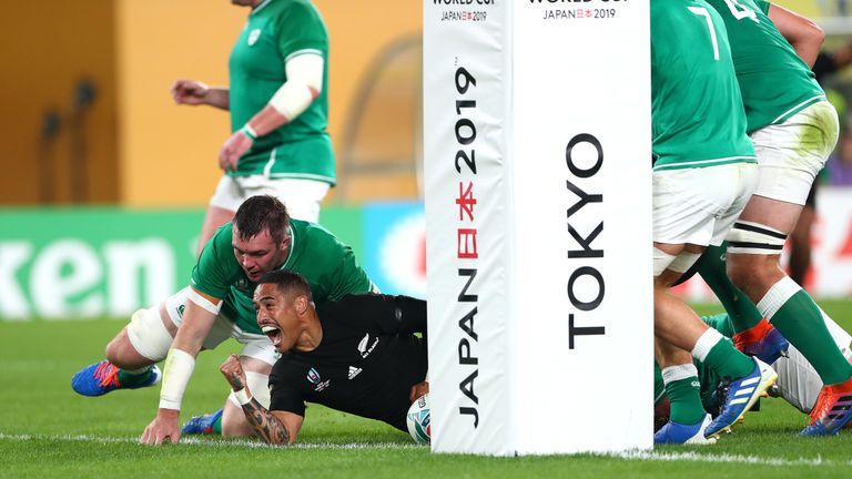 Aaron Smith celebrates scoring New Zealand's first try